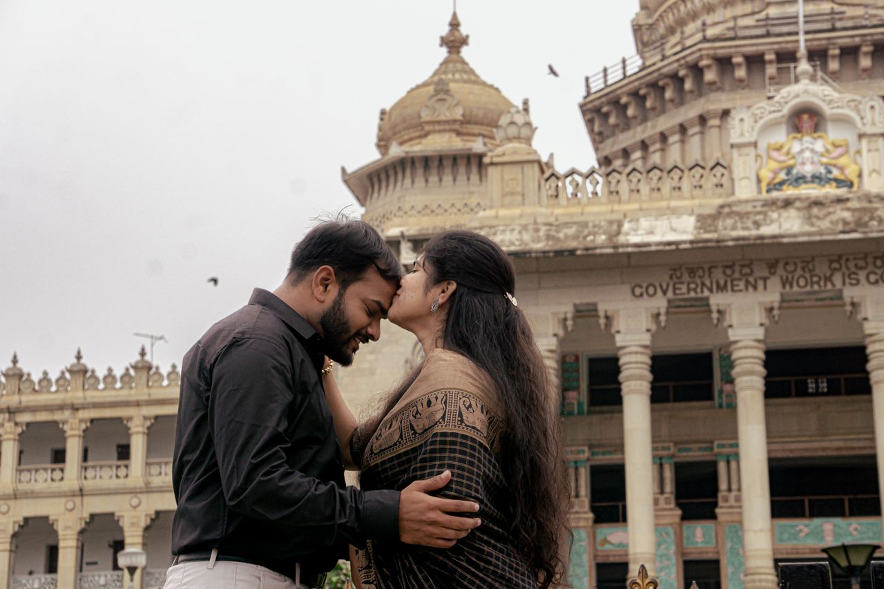 creative-03 Romantic moment between couple in front of Vidhana Soudha, Bangalore.